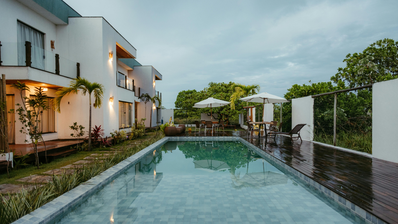 Villa with pool at dusk